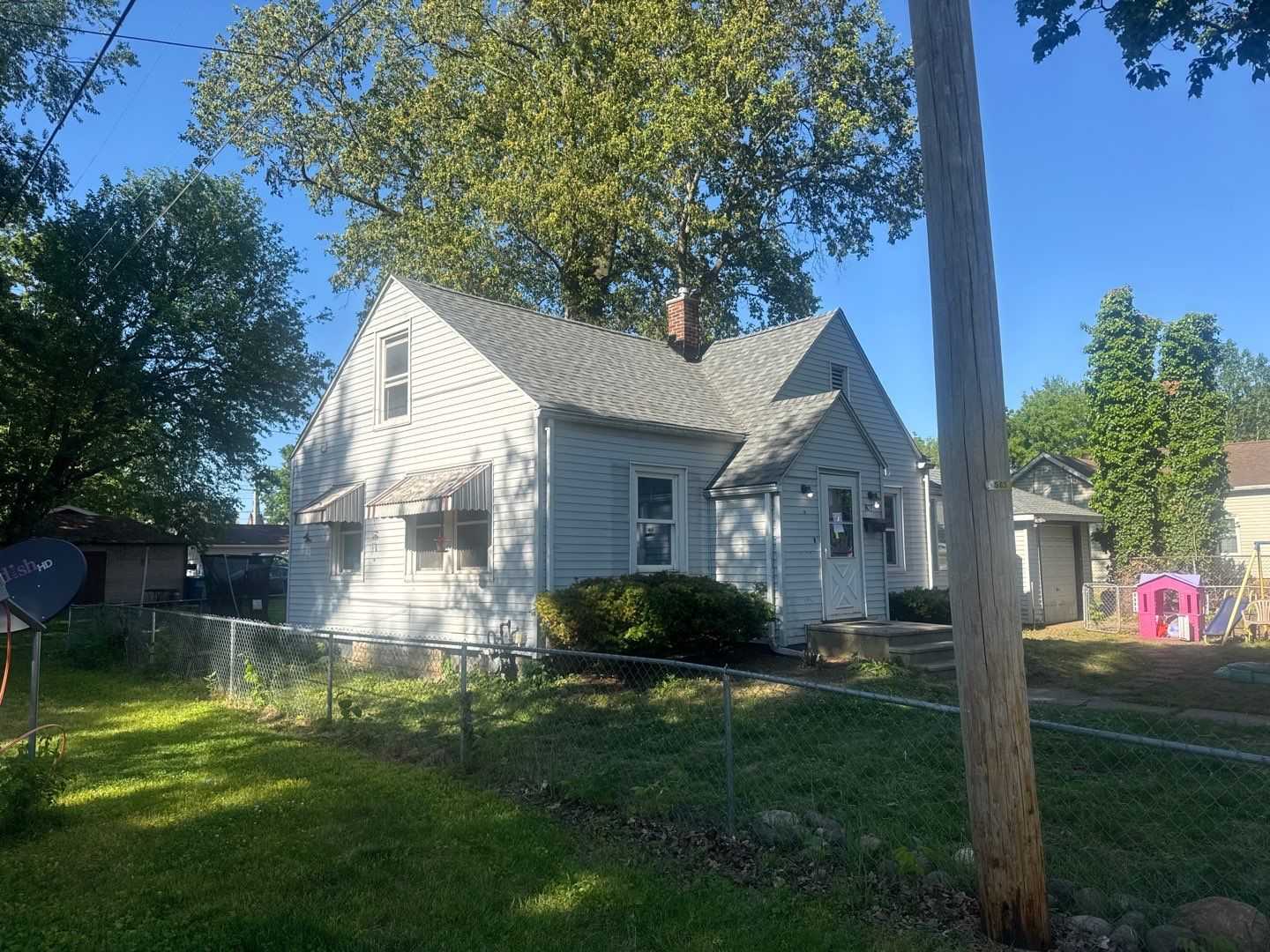 Front exterior view of LaPorte Colonial Slate house reroof
