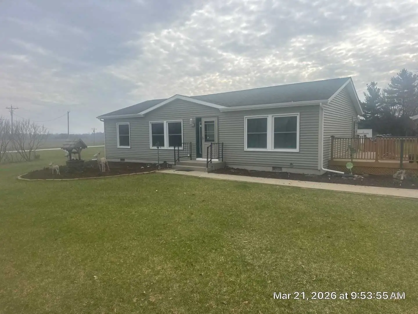 Front exterior view of Hanna Cypress siding installation