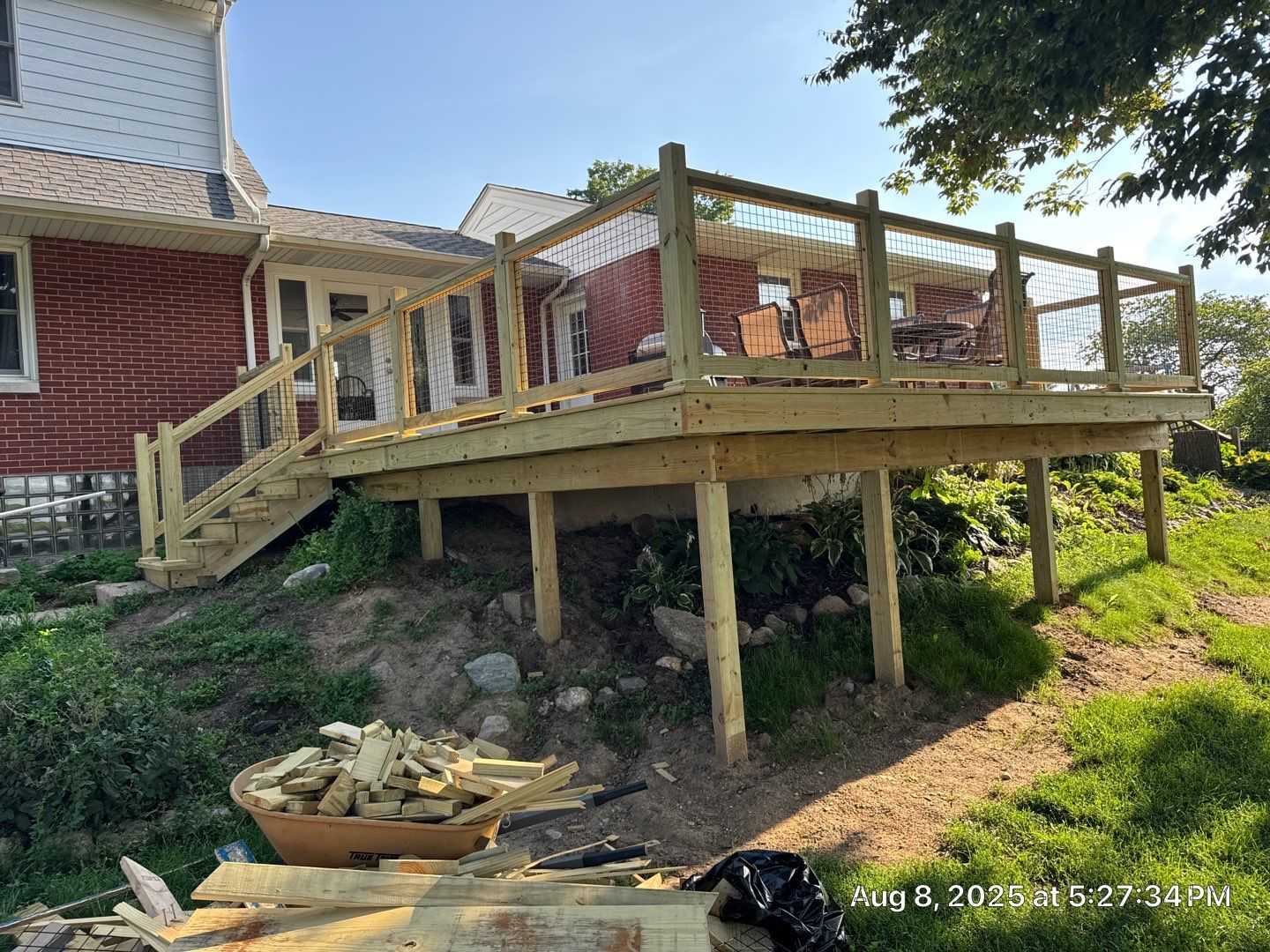 Deck stairs and railing on Valparaiso LP SmartSide deck and patio door installation