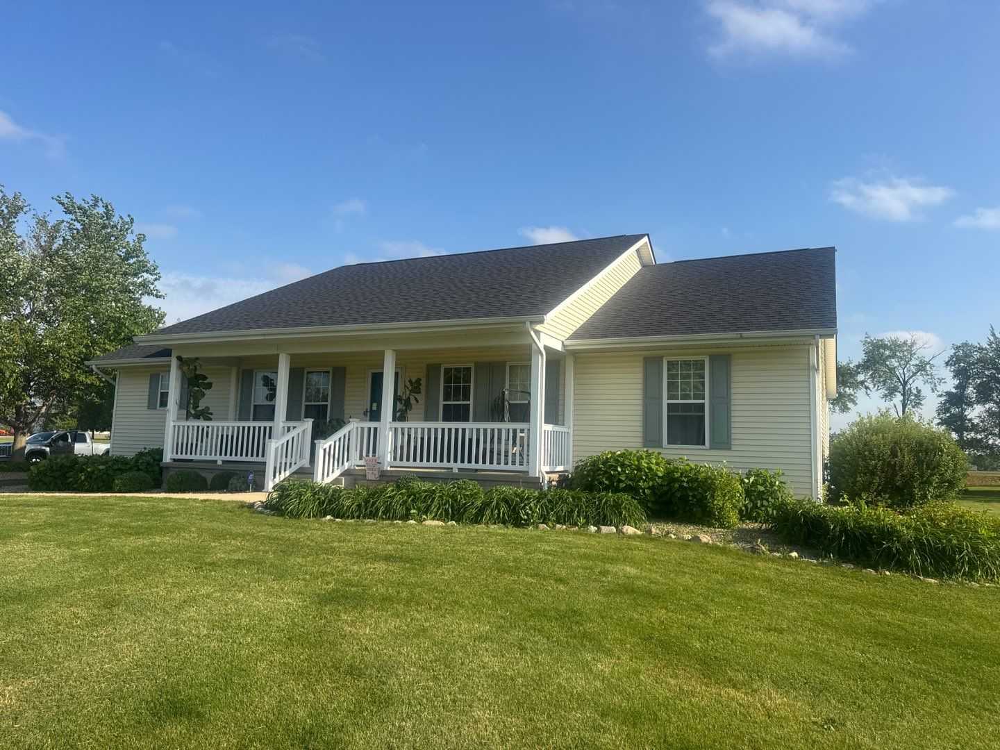 Dark shingle roof installed by Valparaiso roofers at Goodwin Construction on a home.