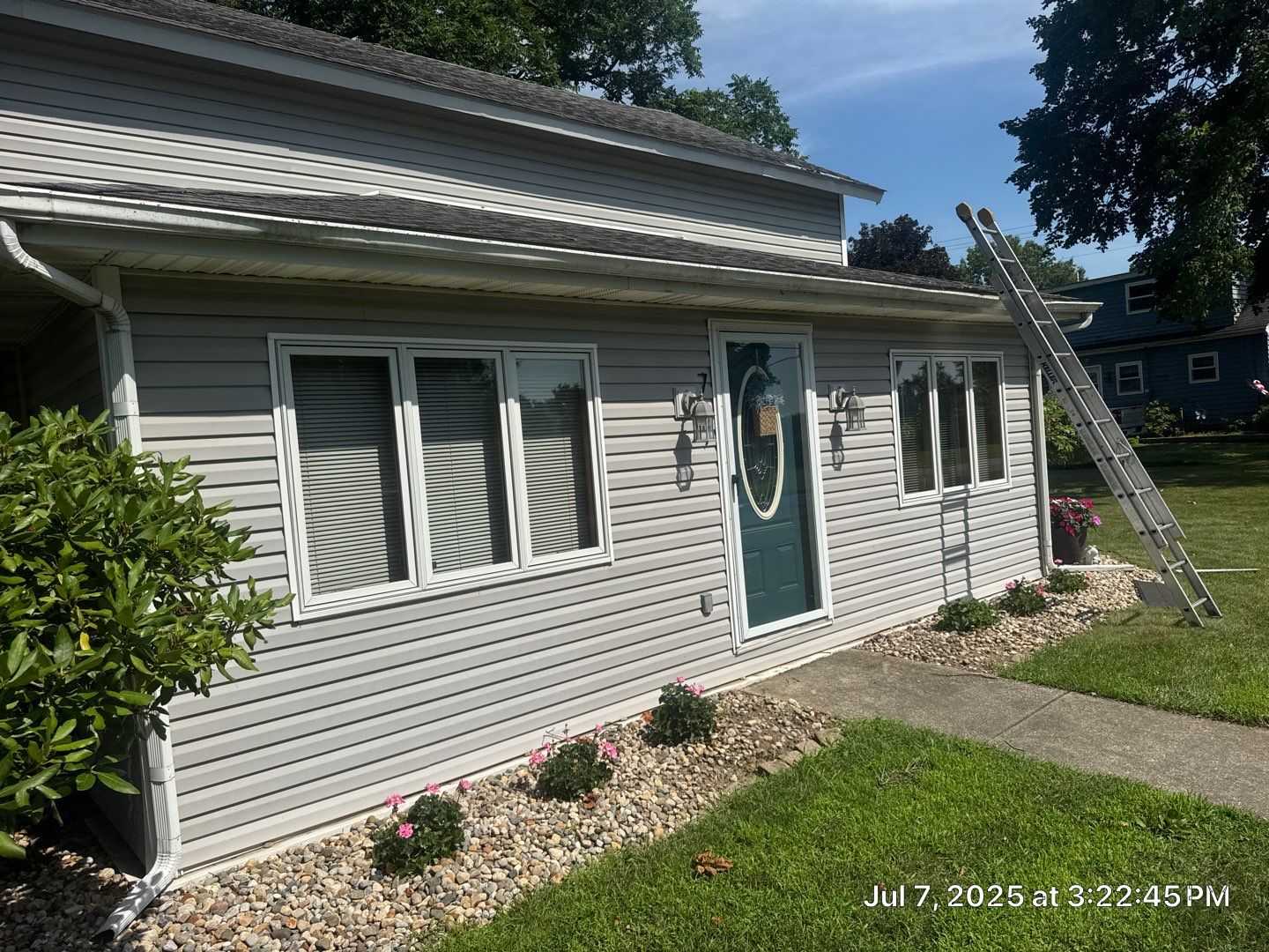 Old siding on Union Mills siding and door replacement project