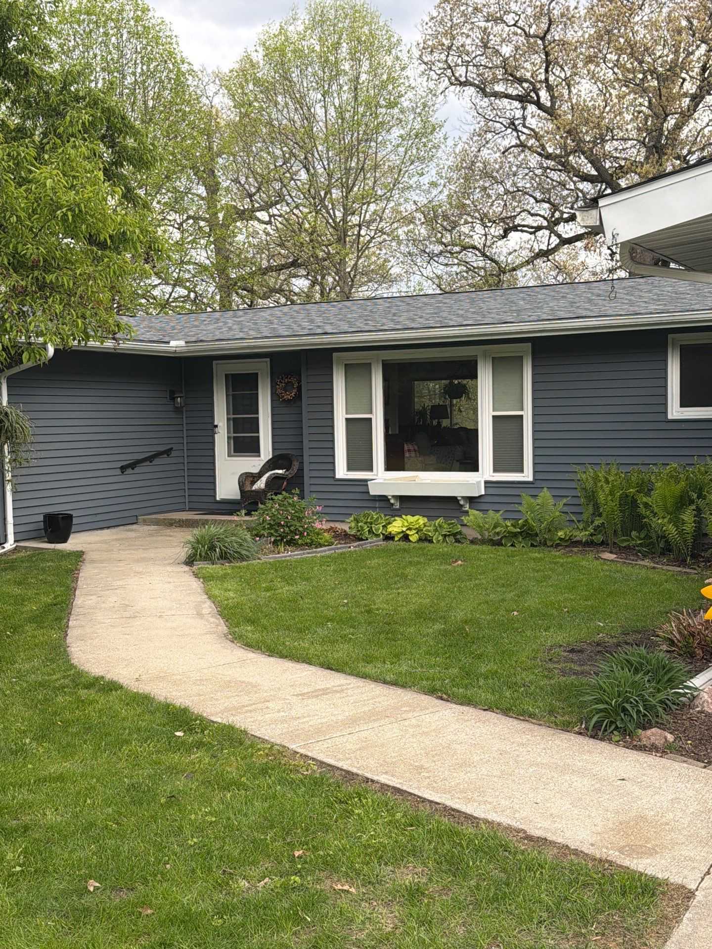 Exterior repair view of LaPorte windstorm roof replacement